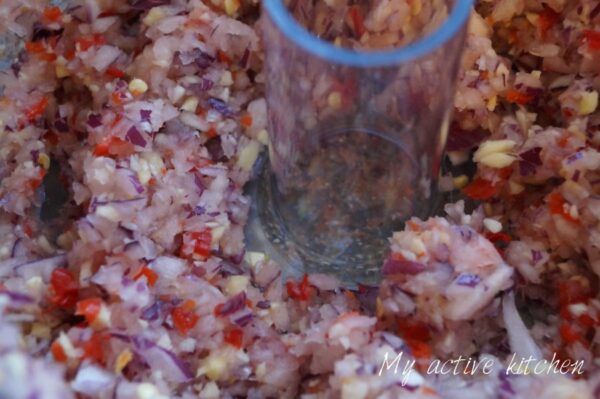 close shot of blended pepper mix in food processor