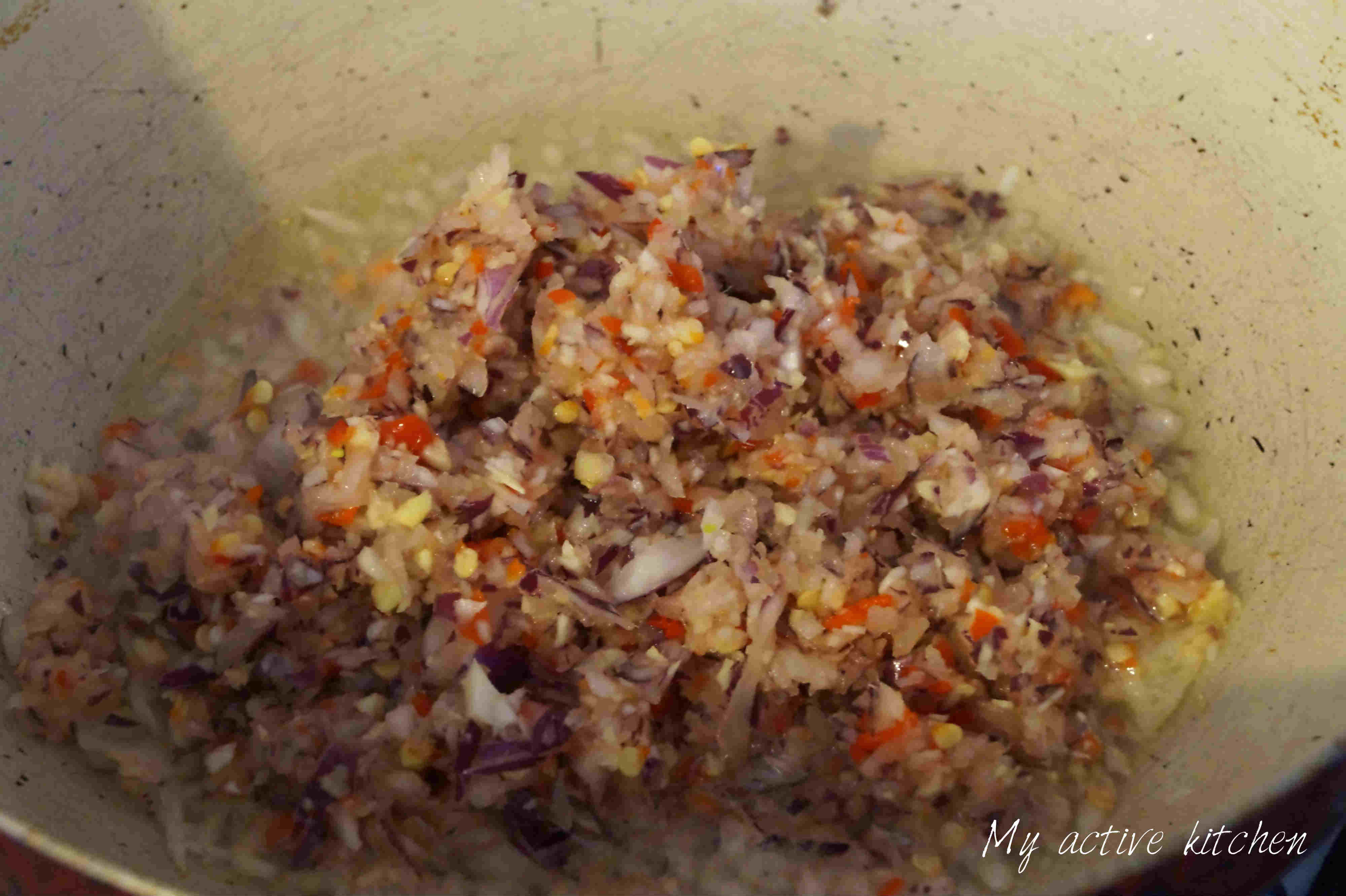 blended pepper mix in a pot of hot oil.