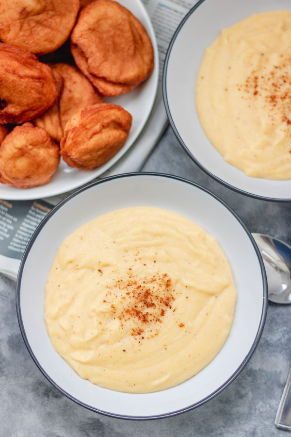 overhead shot of cornmeal porridge and akara