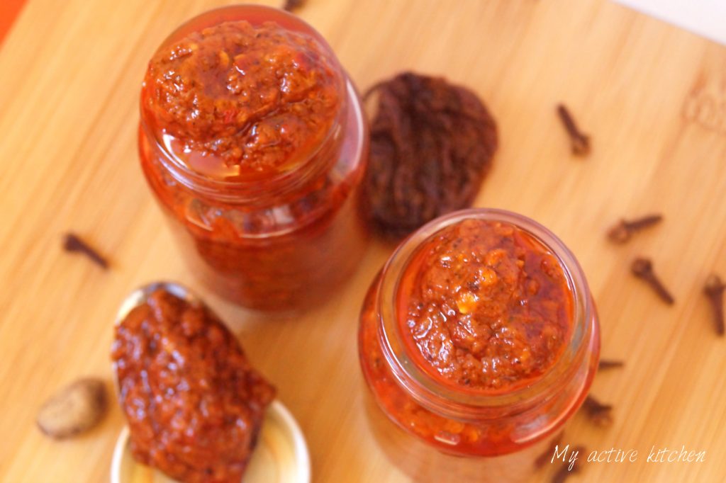 overhead shot of homemade harissa paste in two jars