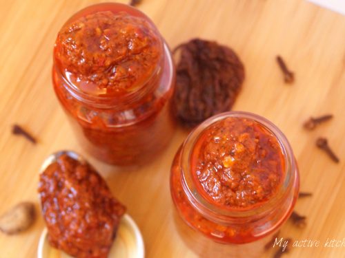 overhead shot of homemade harissa paste in two jars