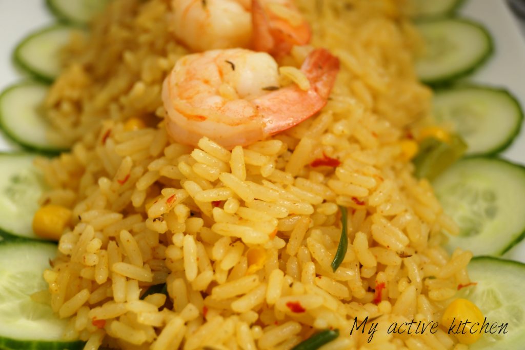 a close photograph of rice and shrimps