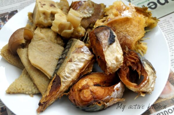 image of smoked mackerel, cooked shaki, bokoto and panla on a white plate