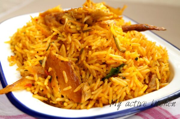 native jollof rice in a white bowl