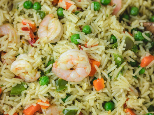 rice and vegetable rice in a cast iron pot.