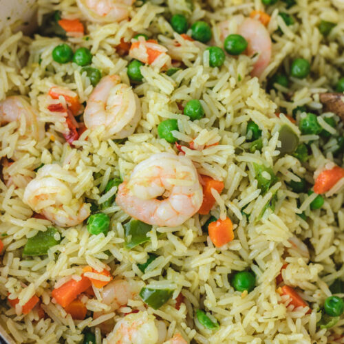 rice and vegetable rice in a cast iron pot.