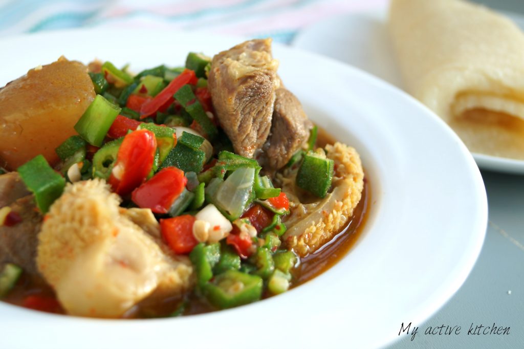 okra soup with assorted meat and rolled eba