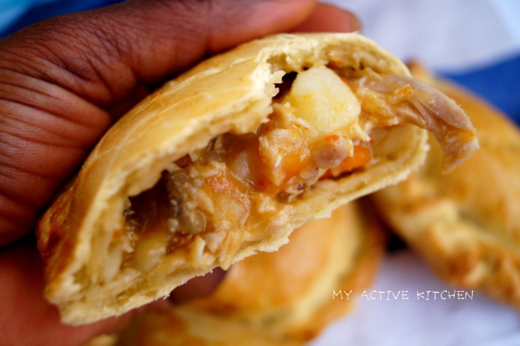 nigerian chicken pie on a napkin.