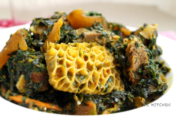 Image of edikaikong loaded with honeycomb shaki, goat meat and ponmo
