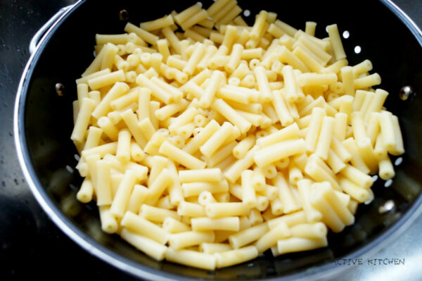 cooked macaroni in a colander