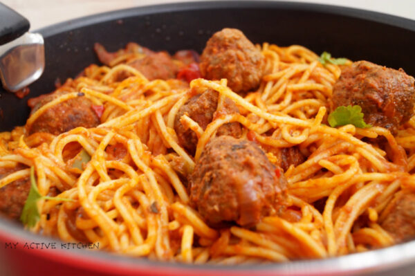 Jollof spaghetti and meatballs 
