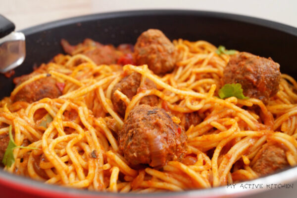 spaghetti and meatball in a pan.