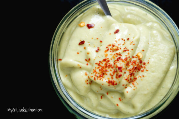 spicy avocado dressing in a ramiekin