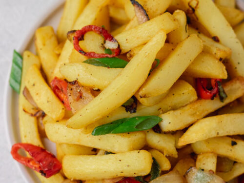 a plate of Chinese salt and pepper chips.