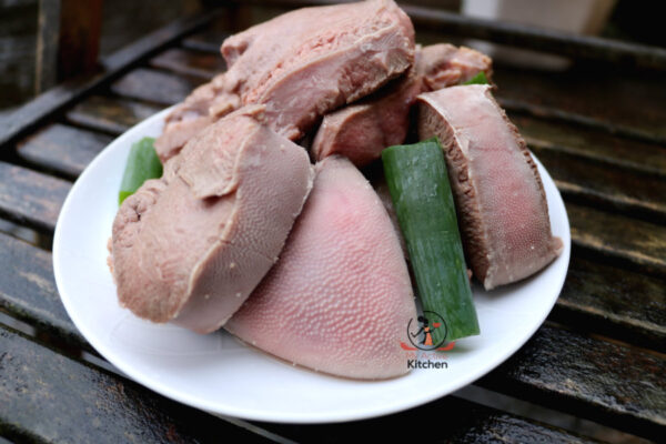 cooked tongue on a plate.