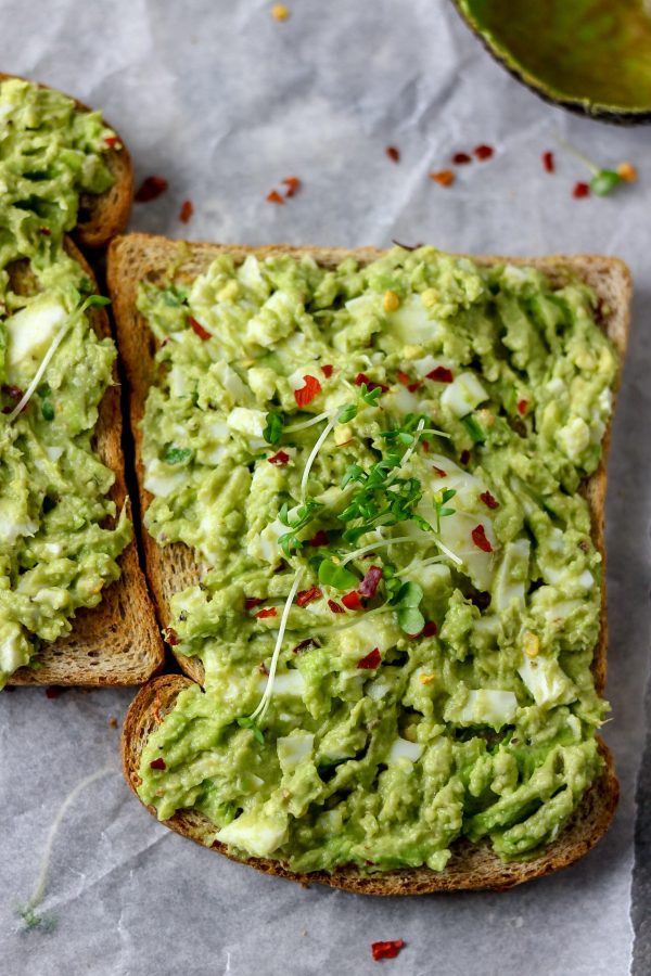 avocado egg salad made with avocado, eggs, herbs, salt and pepper