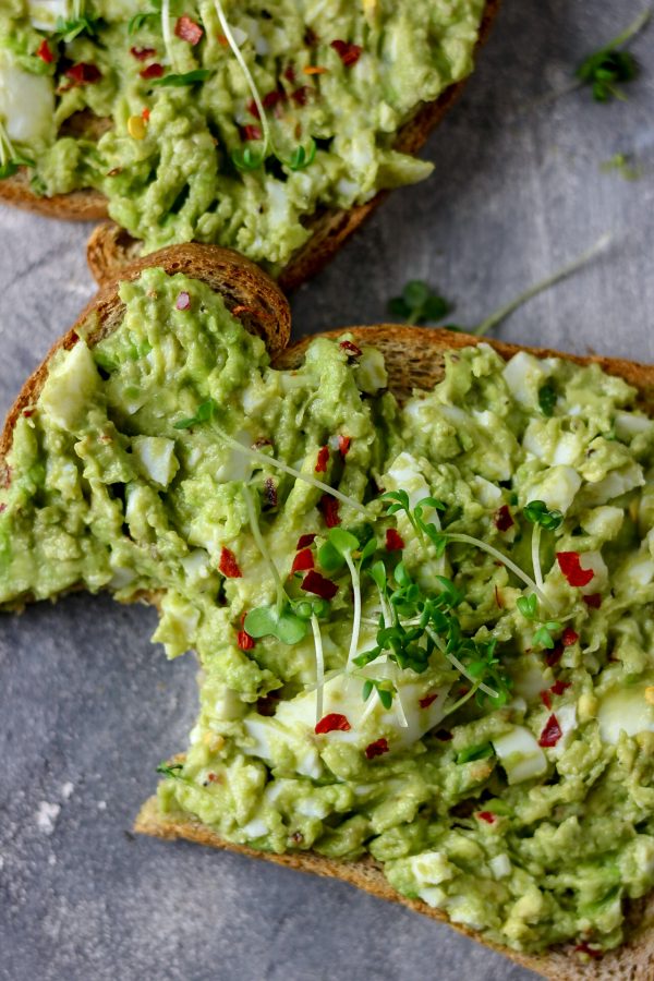 avocado egg salad made with avocado, eggs, herbs, salt and pepper