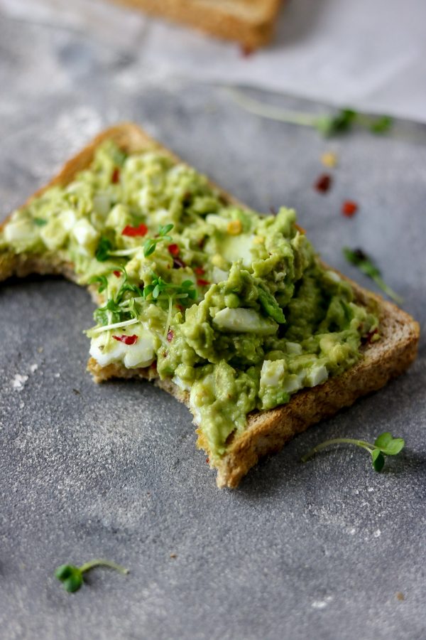 avocado egg salad made with avocado, eggs, herbs, salt and pepper