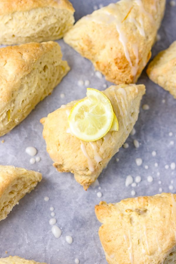 image of triangle big and fluffy triangle scones with lemon drizzle.