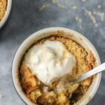 a close shot of apple crumble in a ramekin