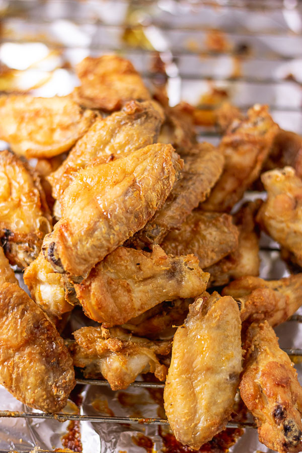 crispy and sticky asian chicken wings! this is an all rounder chicken recipe for all occasions, coated in honey, garlic and soy sauce, this sticky chicken wings is very easy to make too. www.myactivekitchen.com