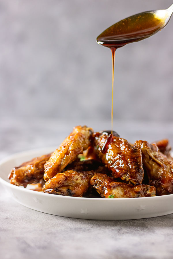 crispy and sticky asian chicken wings! this is an all rounder chicken recipe for all occasions, coated in honey, garlic and soy sauce, this sticky chicken wings is very easy to make too. www.myactivekitchen.com