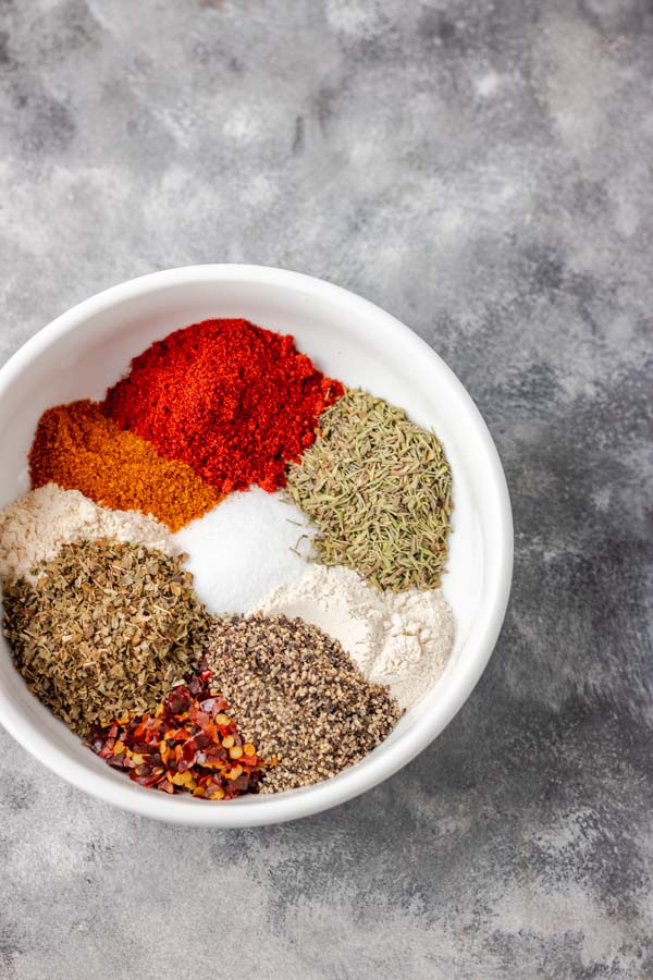 cajun seasoning in a white bowl