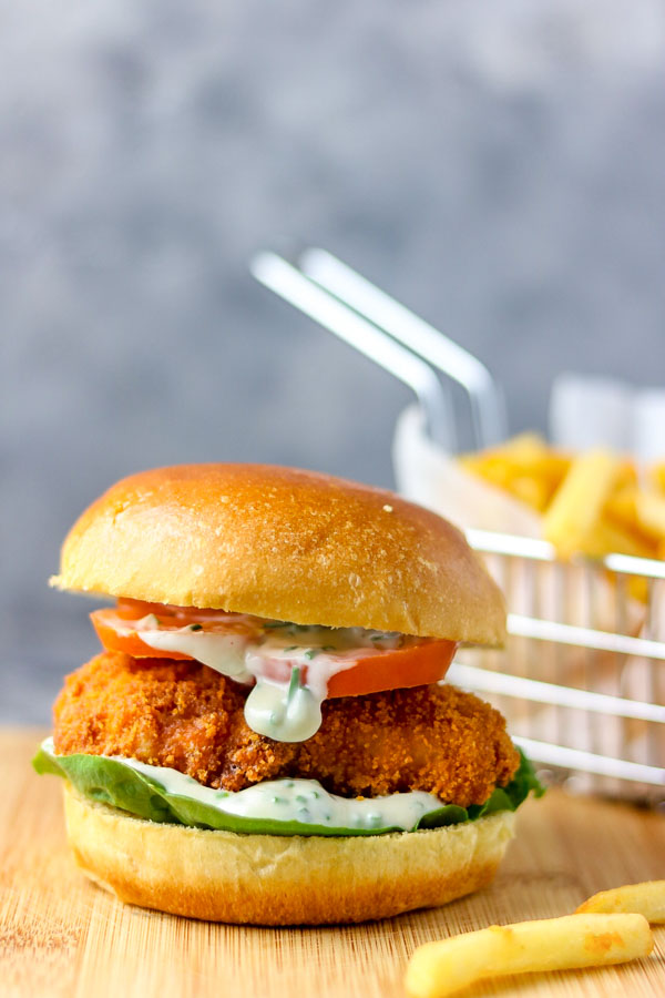 fish burger with chips on the side