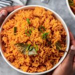 a bowl of coconut jollof rice