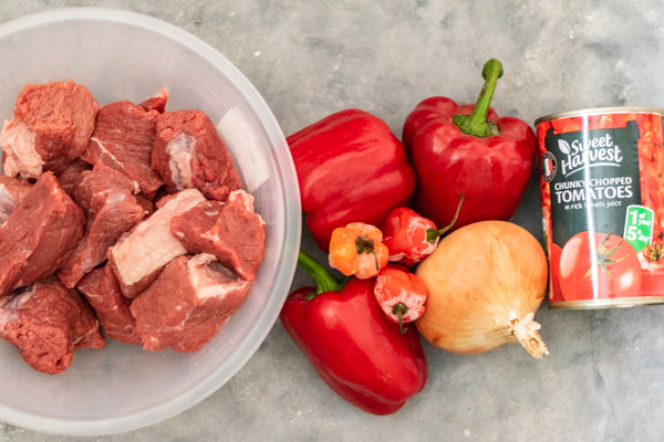 red bell pepper, scotch bonnet, onion and tomatoes