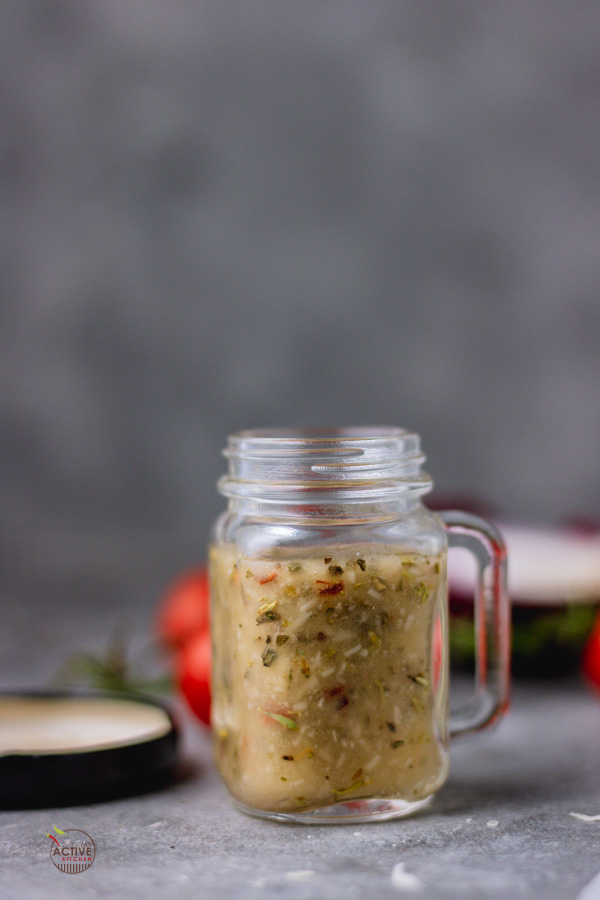 homemade italian dressing in a mason jar.