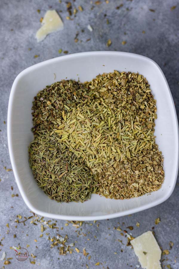 homemade italian seasoning in a small white bowl.