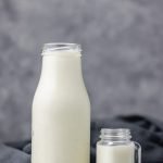 Vanilla coffee creamer in a milk bottle and little mason jar.