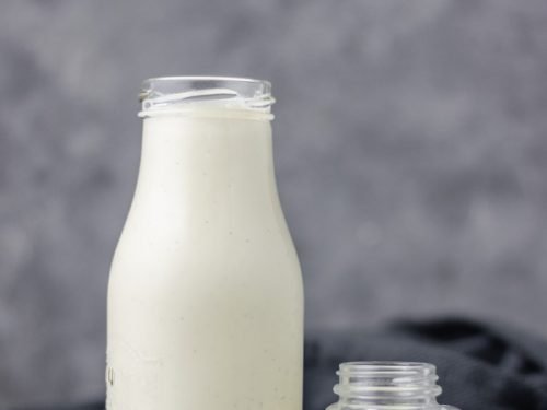 Vanilla coffee creamer in a milk bottle and little mason jar.