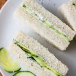 easy cucumber sandwiches with cream cheese fingers on a plate.