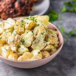 simple potato salad in a pink bowl.