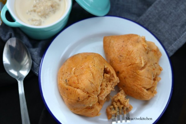 a bowl of two moi moi and a small bowl of porridge.