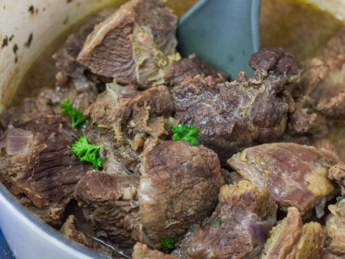 boiled meat in a pot with its stock.