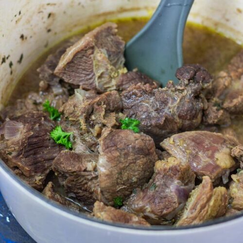 boiled meat in a pot with its stock.