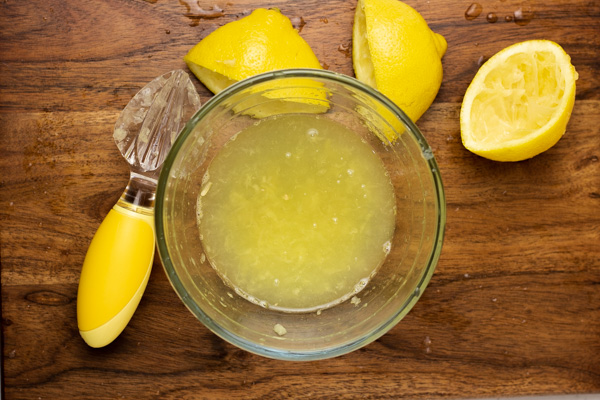 freshly squeezed lemon in a bowl.