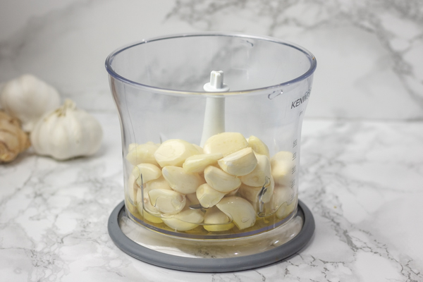 garlic cloves and oil in a blender.