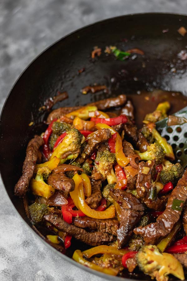 stir fry in a wok.