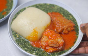 a plate of fufu and soup.