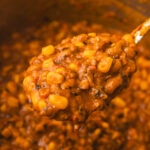 adalu on a ladle.